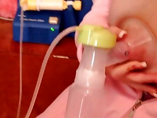 Busty British blonde shows how to pump breast milk